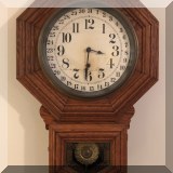 D035. Oak octagonal wall clock. - $85